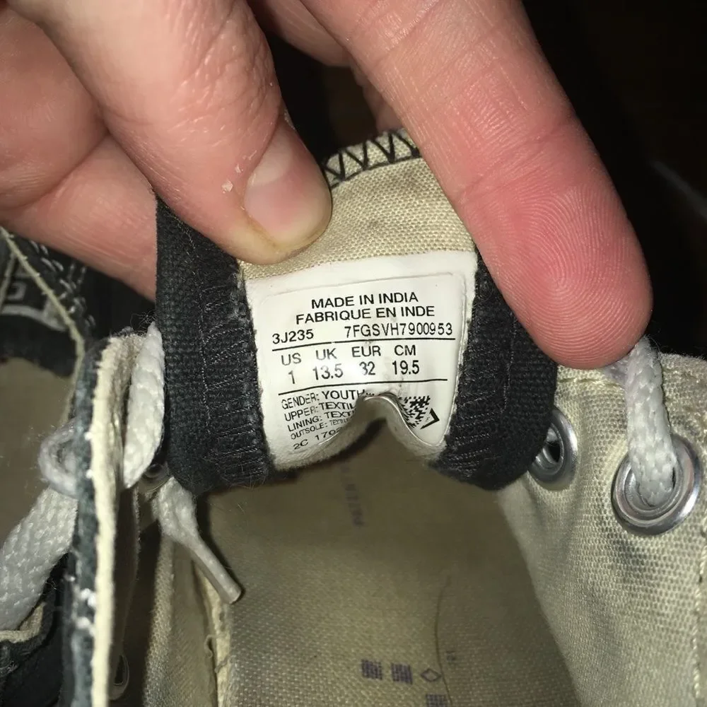 Converse black size 1 low top boat shoes